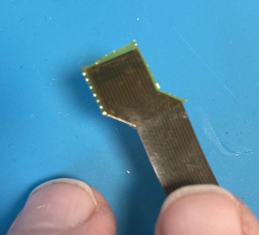 Kapton tape on the end of the ribbon cable
